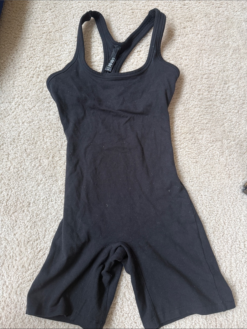 SKIMS Black Racerback One-Piece Romper